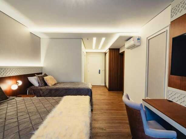 Imagen de la habitación del Hotel RF Vision. Foto 17