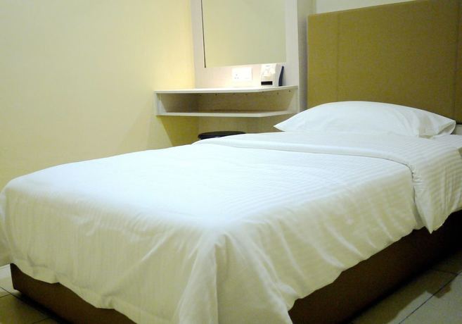 Imagen de la habitación del Hotel RG Grand Hotel. Foto 17