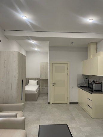 Imagen de la habitación del Hotel RICH apartandhotel. Foto 6