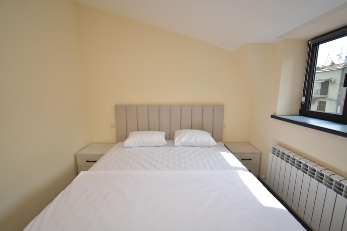 Imagen de la habitación del Hotel RICH apartandhotel. Foto 9