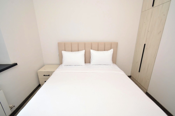 Imagen de la habitación del Hotel RICH apartandhotel. Foto 10