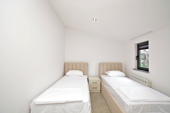 Imagen de la habitación del Hotel RICH apartandhotel. Foto 11