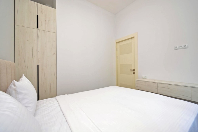 Imagen de la habitación del Hotel RICH apartandhotel. Foto 12