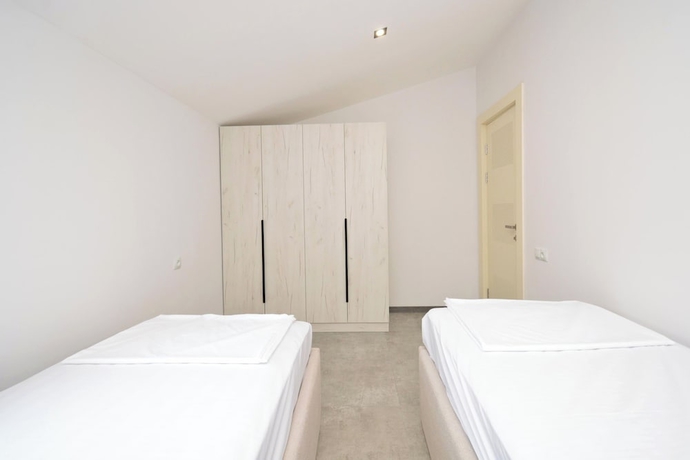 Imagen de la habitación del Hotel RICH apartandhotel. Foto 13