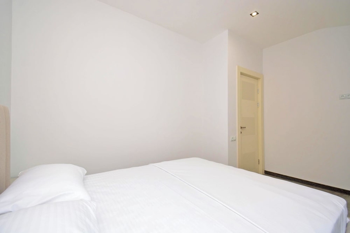 Imagen de la habitación del Hotel RICH apartandhotel. Foto 14