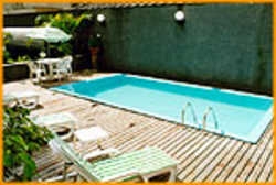 Imagen de la piscina del Hotel RIEMA POETA DRUMMOND FLAT SERV. Foto 7