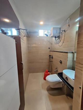 Imagen de la habitación del Hotel RIVA New Digha. Foto 16