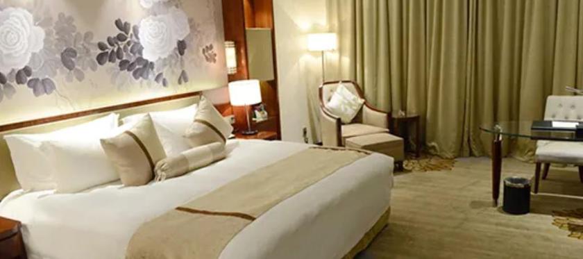 Imagen de la habitación del Hotel RIXIN NEW CENTURY HOTEL YIWU. Foto 2