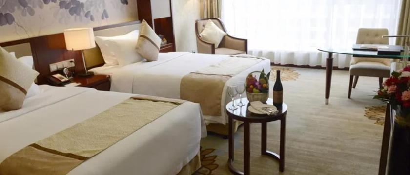 Imagen de la habitación del Hotel RIXIN NEW CENTURY HOTEL YIWU. Foto 4