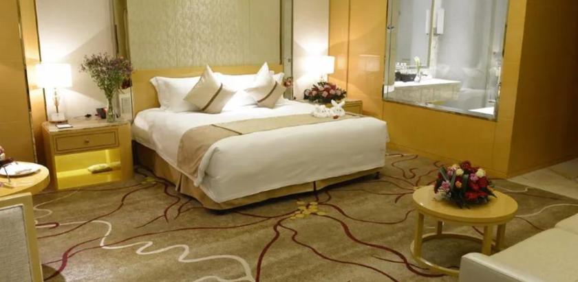 Imagen de la habitación del Hotel RIXIN NEW CENTURY HOTEL YIWU. Foto 7