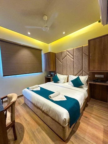Imagen de la habitación del Hotel RK Heights. Foto 3