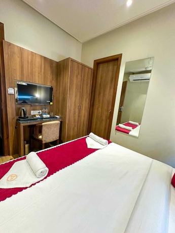 Imagen de la habitación del Hotel RK Heights. Foto 4