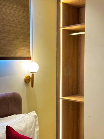 Imagen de la habitación del Hotel RK Heights. Foto 7
