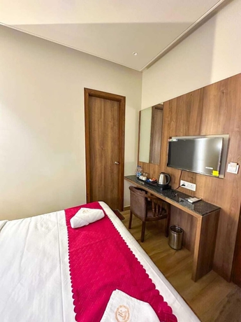 Imagen de la habitación del Hotel RK Heights. Foto 8