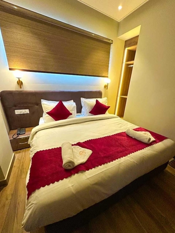 Imagen de la habitación del Hotel RK Heights. Foto 12