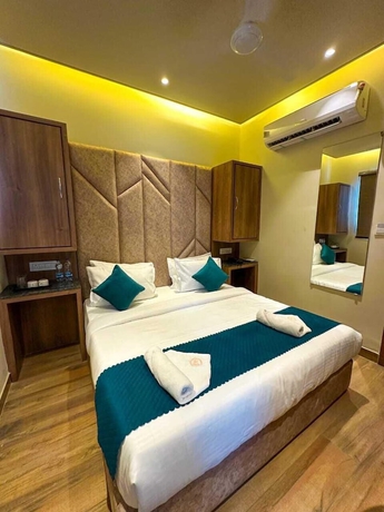 Imagen de la habitación del Hotel RK Heights. Foto 13