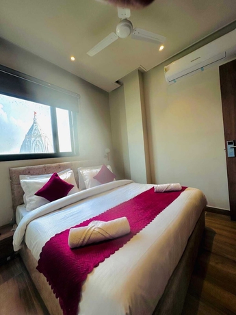 Imagen de la habitación del Hotel RK Heights. Foto 14