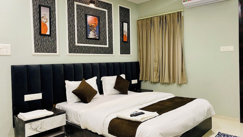 Imagen de la habitación del Hotel RK, Indore. Foto 2