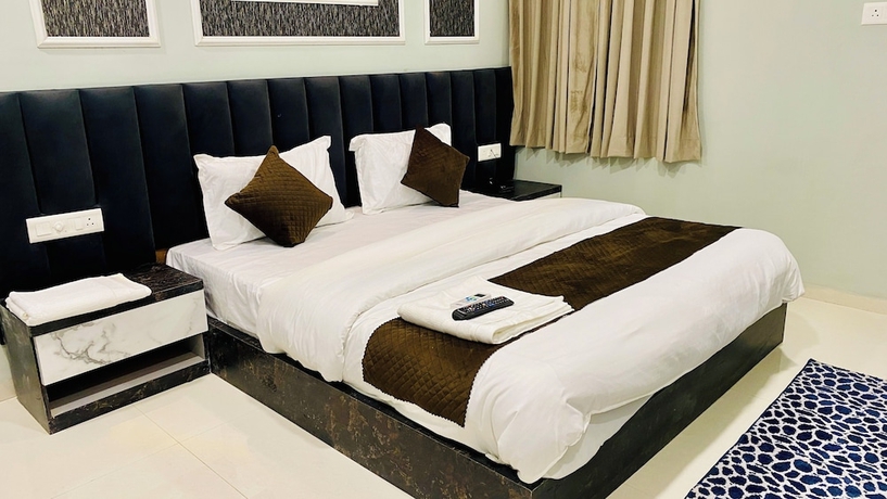 Imagen de la habitación del Hotel RK, Indore. Foto 3