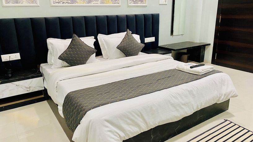 Imagen de la habitación del Hotel RK, Indore. Foto 4