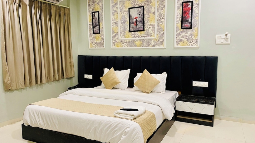 Imagen de la habitación del Hotel RK, Indore. Foto 5
