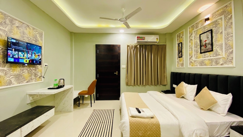 Imagen de la habitación del Hotel RK, Indore. Foto 6