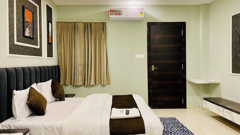 Imagen de la habitación del Hotel RK, Indore. Foto 7