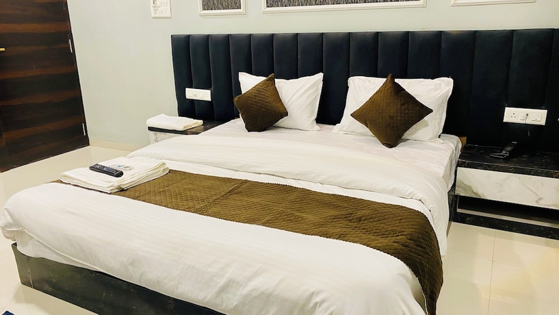 Imagen de la habitación del Hotel RK, Indore. Foto 8