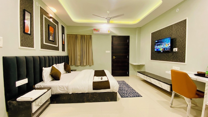 Imagen de la habitación del Hotel RK, Indore. Foto 9