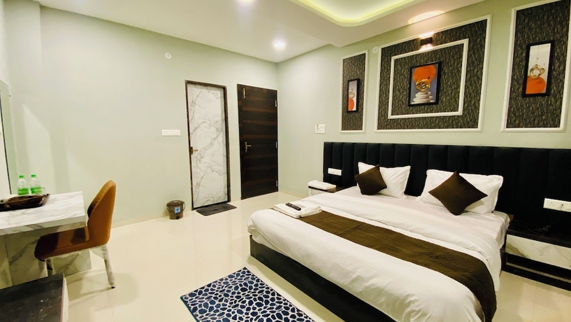 Imagen de la habitación del Hotel RK, Indore. Foto 10