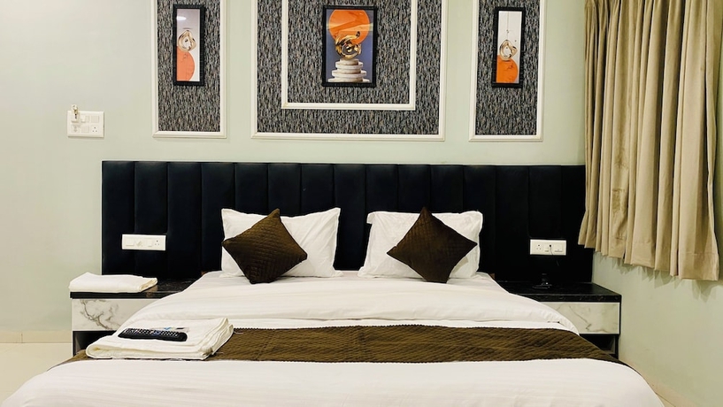 Imagen de la habitación del Hotel RK, Indore. Foto 12