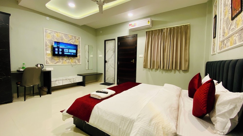 Imagen de la habitación del Hotel RK, Indore. Foto 13