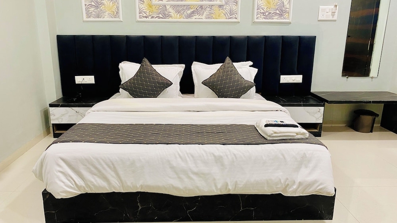 Imagen de la habitación del Hotel RK, Indore. Foto 14