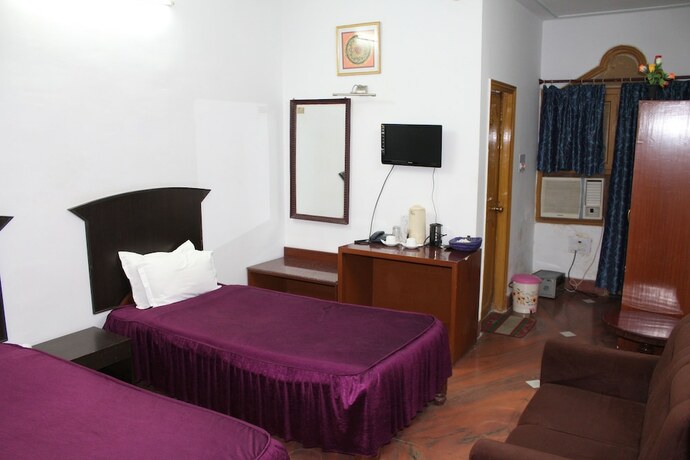 Imagen de la habitación del Hotel R.K International. Foto 8