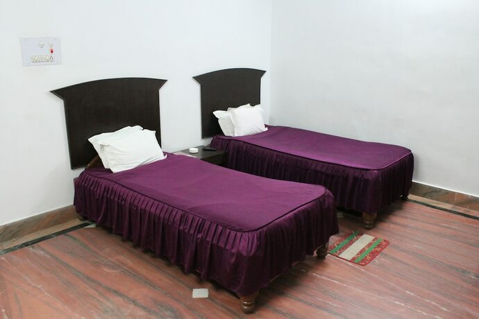 Imagen de la habitación del Hotel R.K International. Foto 12