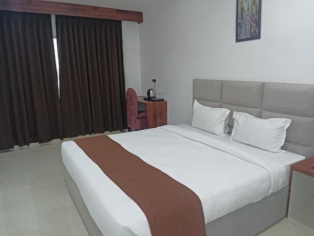 Imagen de la habitación del Hotel RKD Inn. Foto 9