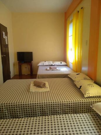 Imagen de la habitación del Hotel RMTM\'s Beachfront Accommodation. Foto 17