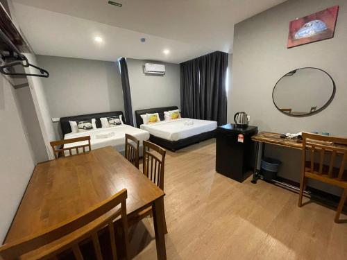 Imagen de la habitación del Hotel RNK BoutiQue HOTEL. Foto 20