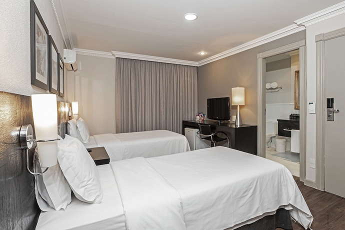 Imagen de la habitación del Hotel ROCKEFELLER by Slaviero Hotéis. Foto 9