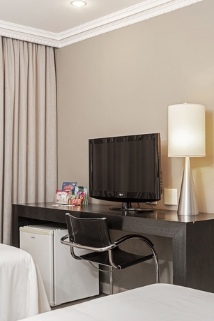 Imagen de la habitación del Hotel ROCKEFELLER by Slaviero Hotéis. Foto 10