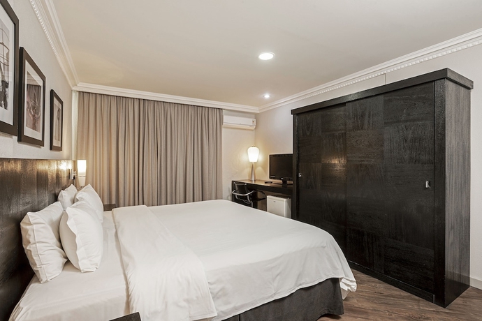 Imagen de la habitación del Hotel ROCKEFELLER by Slaviero Hotéis. Foto 12