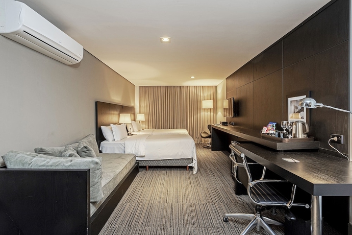 Imagen de la habitación del Hotel ROCKEFELLER by Slaviero Hotéis. Foto 13