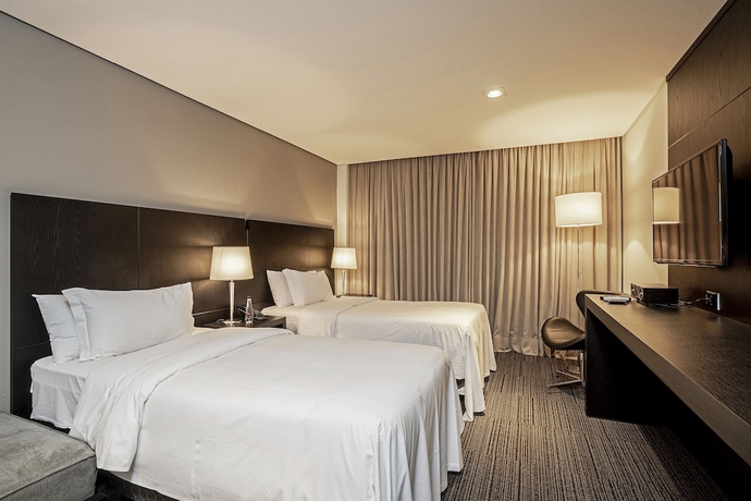 Imagen de la habitación del Hotel ROCKEFELLER by Slaviero Hotéis. Foto 14