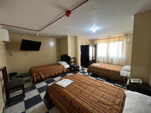 Imagen de la habitación del Hotel RODEY. Foto 12