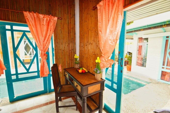 Imagen de la habitación del Hotel ROMANTIC Pool Villa. Foto 12