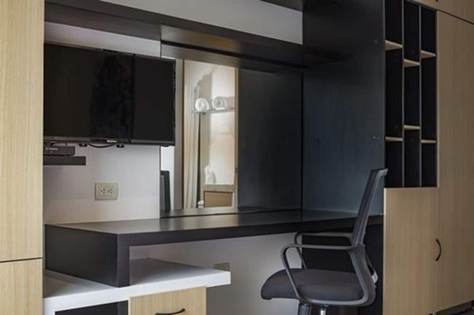 Imagen de la habitación del Hotel ROOM and Suites. Foto 2