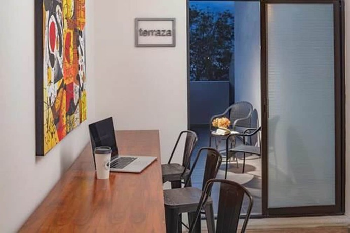 Imagen de la habitación del Hotel ROOM and Suites. Foto 3
