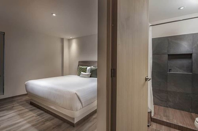 Imagen de la habitación del Hotel ROOM and Suites. Foto 6