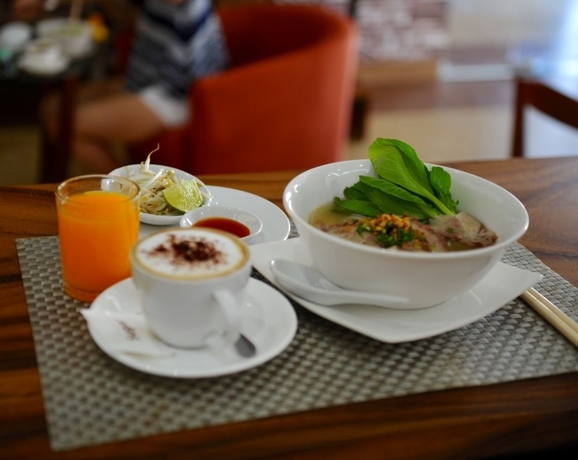 Imagen del bar/restaurante del Hotel ROYAL INN, Phnom Penh. Foto 3