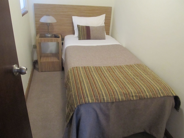 Imagen de la habitación del Hotel RQ Costanera Apartments. Foto 12